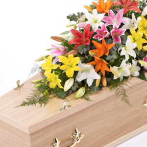 Vibrant Lily Casket Spray